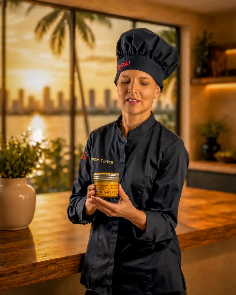 Chef Marina Staver handing over a finished StaverY overnight oats jar at golden hour